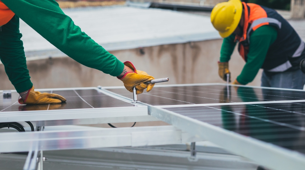 Workers solar panels